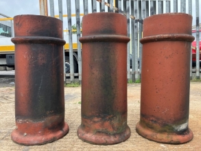 Trio of terracotta chimney pots