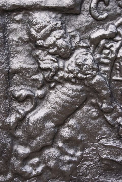 Cast iron fire-back