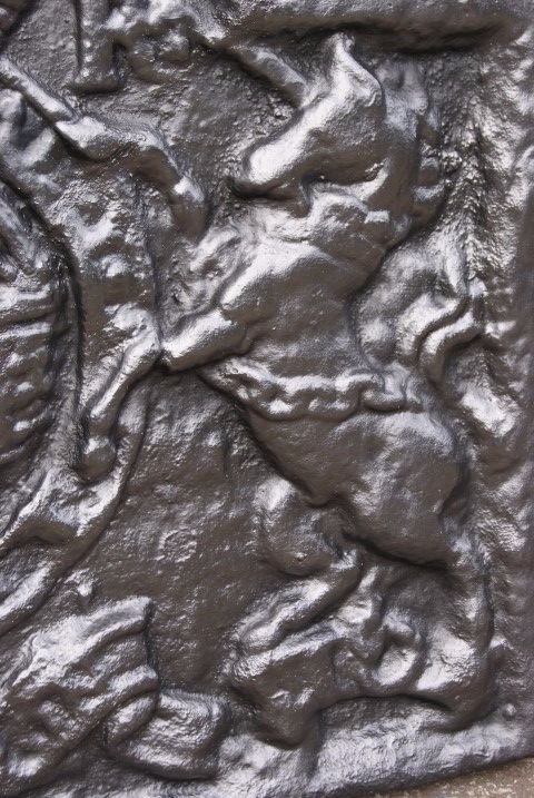 Cast iron fire-back