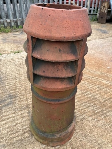 Terracotta louvered chimney pot