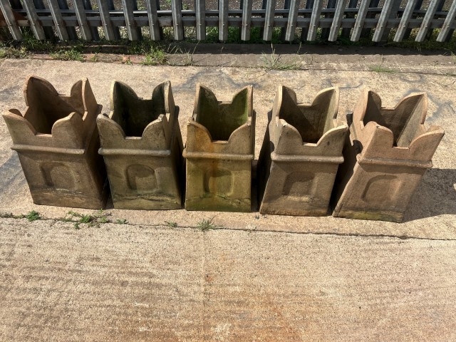 Buff castellated chimney pots
