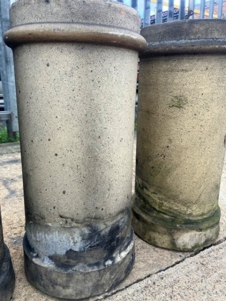 Four buff chimney pots