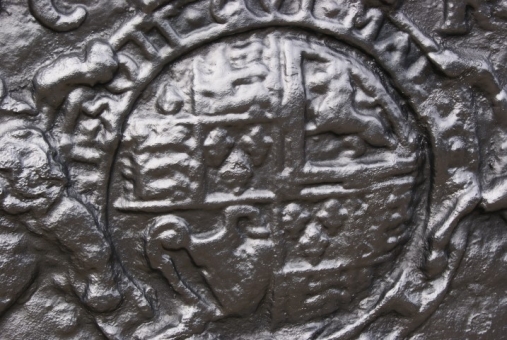 Cast iron fire-back