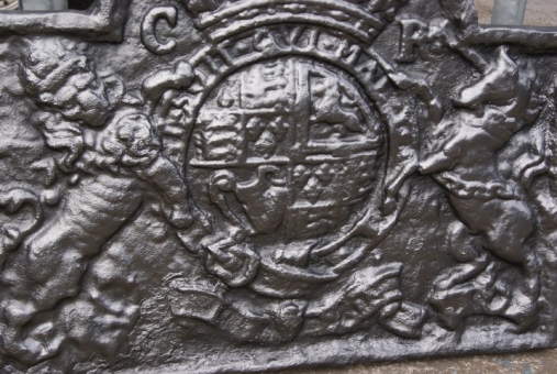Cast iron fire-back