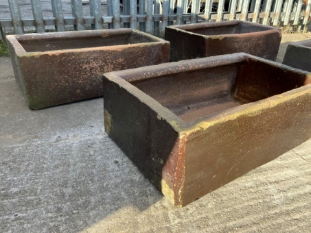 Four salt glazed troughs