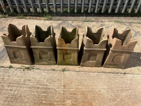 Buff castellated chimney pots