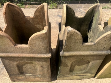 Buff castellated chimney pots