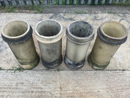 Four buff chimney pots