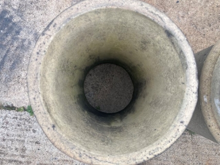 Four buff chimney pots